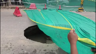 Massive sinkhole appears on Gurugram's IFFCO Chowk road after rain