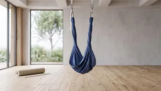 The Focus Demands Behind Every Controlled Aerial Yoga Transition