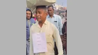 Man Brings Soil from Father’s Grave to SIR Hearing Camp to Prove Citizenship in West Bengal - Video