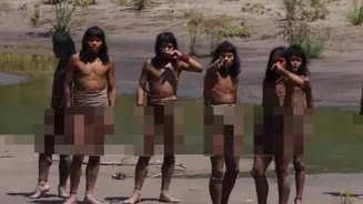 Captured Up Close: Never-Before-Seen Footage Of Uncontacted Amazon Tribe Sparks Global Buzz | WATCH