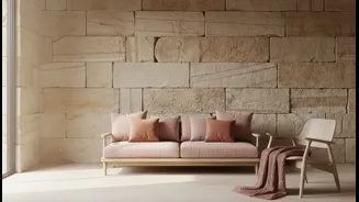 Sandstone Walls Let Dusty Rose Textiles Add Controlled Warmth