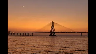 Mumbai's first real monsoon Sunday — Marine Drive's packed despite the orange alert