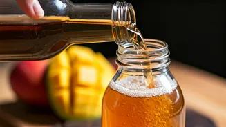 Make Sparkling Probiotic Mango Kombucha Using Overripe Sweet Pulp