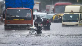 Mumbai Monsoon Fury: Heavy Rain Waterlogs City, IMD Issues Orange Alert - Check Flight Advisory