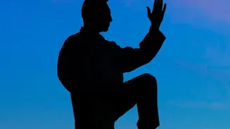 Tai Chi On Sand Adds A Balance Challenge To Slow, Controlled Movement