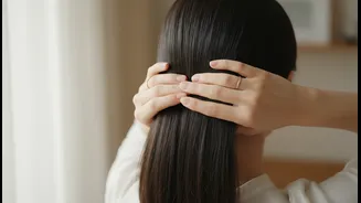A Light Mousse Adds Control before Hair Is Gathered at the Nape