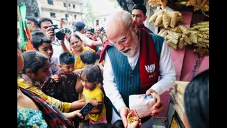 A Street-Side Pause: PM Modi Enjoys Jhalmuri With Locals During Poll Campaign In Jhargram