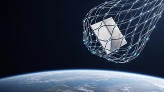 Magnetic Nets And Laser Harpoons Lead Effort To Clear Dead Satellite Junk In Orbit