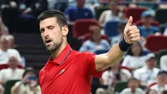 Djokovic matches Federer, books ATP Finals berth