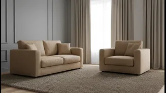 Grey Walls Gain Softness From Taupe Rugs, Curtains and Upholstery