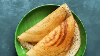 A Crisp Green Gram Crepe Wraps Warm Upma Inside