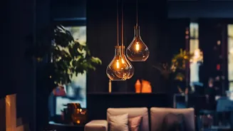 Modern Indian Interiors Are Using Lighting To Highlight Art, Furniture, Plants And Architectural Details