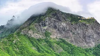 Unlock perfect monsoon getaway amidst misty temples and scenic hills in Girnar