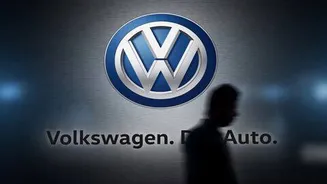 Volkswagen and JLR cut jobs to catch up in EVs