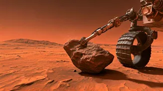 Curiosity's Martian Mischief: How a Rogue Rock Got Stuck and Finally Broke Free