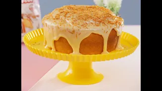 Bolo vulcão com cobertura de brigadeiro branco e coco queimado