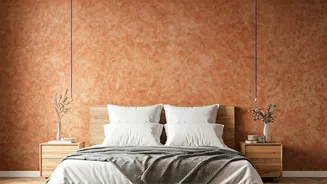 Earthy Terracotta Clay Washes Replace Standard Wallpaper In Modern Bedrooms