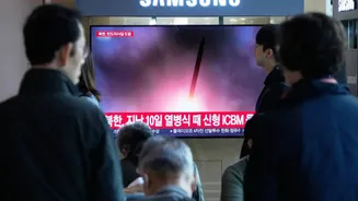 North Korea Fires Cruise Missiles Just Hours Before Trump Lands in Seoul