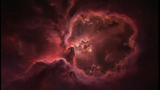 Hubble's Crimson Cloud Makes Star Birth Click