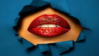 How Glossy And Blurred Red Lips Are Updating A Familiar Festive Makeup Staple