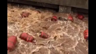 Video: 3,000 LPG Cylinders Swept Into Patalganga River After Heavy Rain
