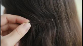 The Best Pin Colour Disappears into the Hair Instead of Becoming an Accent