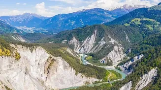 Exploring The Alps From The Air Offers Views Of Peaks And Mountain Valleys