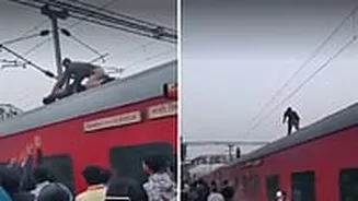 Pratapgarh Shocker: Man Climbs Onto Roof Of Moving Kashi Vishwanath Express, Halts Line For 40 Minutes Before GRP Constable Rescues Him | VIDEO