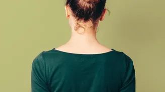 A Low Pencil Chignon Adds a Neater Finish to Loose Hair