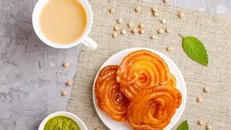 Jalebi Batter Is Piped Into Oil and Finished in Sugar Syrup