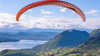 Paragliding In The French Alps Is Often Planned Around Suitable Spring And Summer Weather