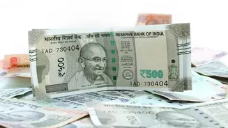 Rupee strengthens as falling crude oil prices lift sentiment