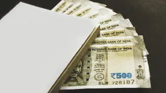 US vs USD: Rupee falls 12 paise to 91.05 against US dollar