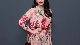 Why loose Waves Can Carry Floral Accents Without Becoming A Full Updo