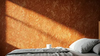 Textured Earthy Bedroom Walls Created via Natural Terracotta Clay Washes