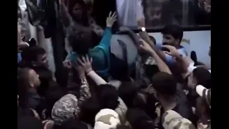 Priyanka Gandhi lies down on road amid protest