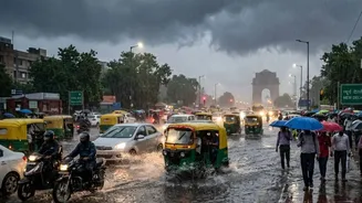 Delhi Weather Today: City Wakes Up To Heavy Rain, Waterlogged Roads And Traffic Chaos
