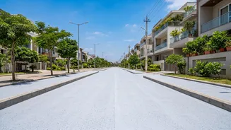 Reducing Ambient Neighborhood Temperatures: Reflective Street Pavements With Cool Coatings