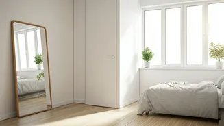 Use Strategic Mirror Tricks To Brighten Up Your Studio Flat