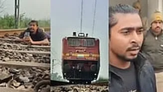 Uttar Pradesh: Instagram Creator Shoots Reel By Lying On Railway Tracks As Train Passes Over Him In Mau; Police React | VIDEO
