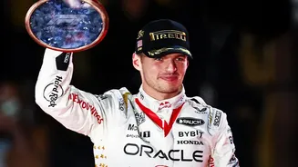 Pure chaos in Singapore GP sprint race as Max Verstappen clinches victory with Ferraris taking P2 & P3