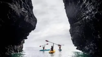 Explore Tasmania's remote sea caves by kayak