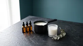 Making Scented Candles At Home Uses Fragrance Oils To Add Aroma To Melted Wax
