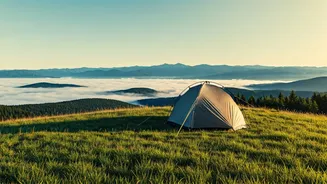 Camp Amid Clouds And Endless Greenery