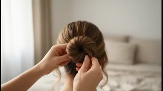 Twist the Ponytail Evenly to Keep a Low Bun Compact and Balanced