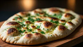 Bake Garlic Sourdough Naan For Your Next Weekend Challenge