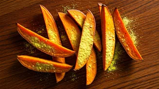 Toss Air Fried Sweet Potato Wedges In Nutritional Yeast