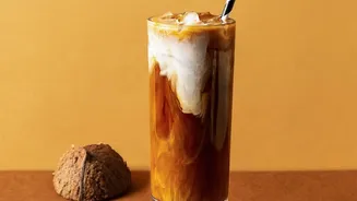 Biscoff Iced Latte Mixes Caramelised Spread With Coffee And Cold Milk Becomes More Relevant Once A Pinch Of Salt Can Balance The Sweetness Of Bisco...
