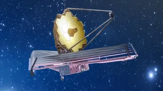 How Webb Telescope Detects Faint Heat Signatures From Ancient Galaxy Formations In Deep Space