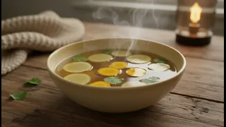 Why Low-Calorie Plant Broths Layered With Ginger And Turmeric Rule Rainy Evening Menus